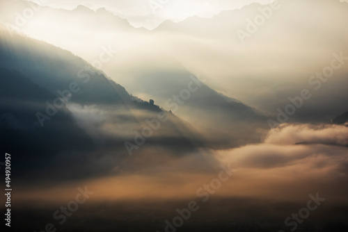 misty sunrise over the mountains