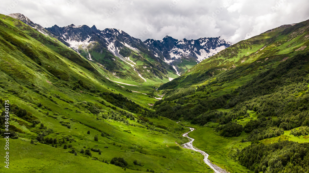 Stunning Mountains of High Caucasus in Georgia in Svaneti Region. Travelling and hiking the Sagari-Pass. Beautiful landscape.