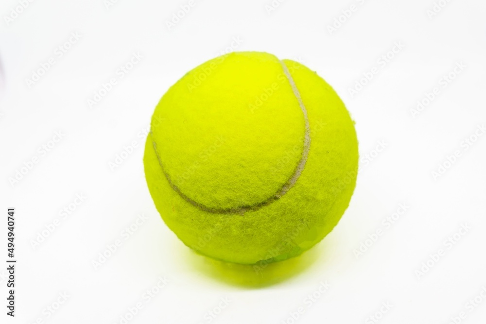 Yellow tennis ball isolated on white background