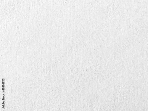 Seamless texture of white cement wall a rough surface, with space for text, for a background.