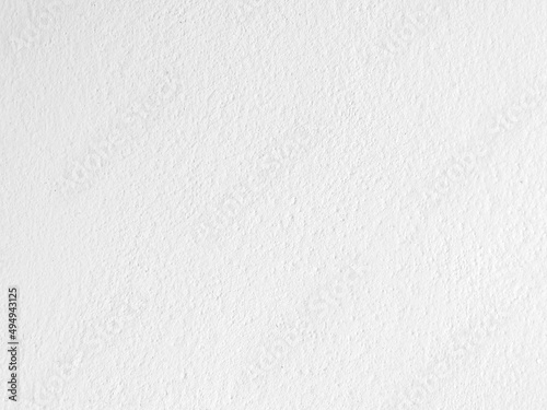 Seamless texture of white cement wall a rough surface, with space for text, for a background.