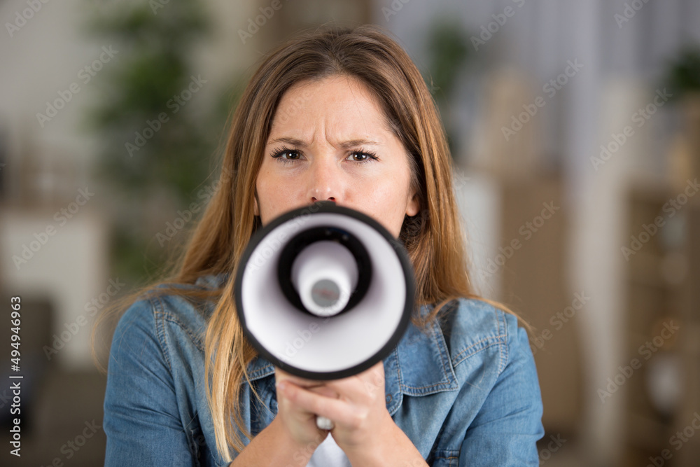 pretty woman with a megaphone