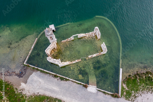 Ruined old church in Alassa, Cyprus is submerged under water of Kouris dam, photographed from drone photo