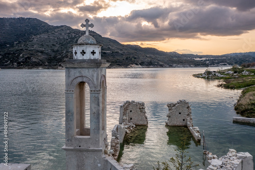 Ruined old church in Alassa  Cyprus is submerged under water of Kouris dam  photographed from drone