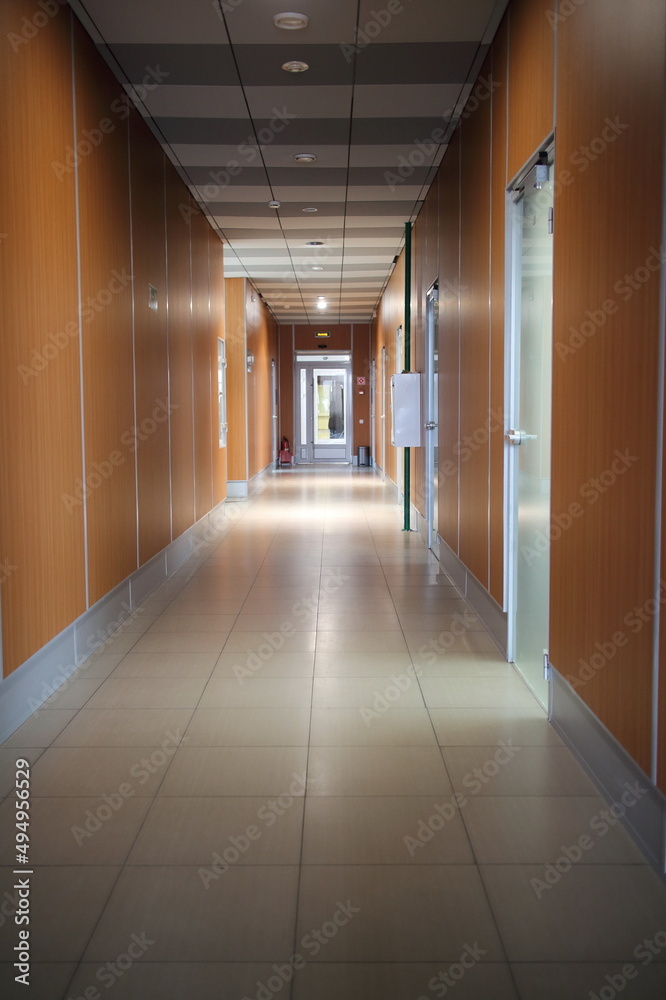 corridor in an office building on a sunny day