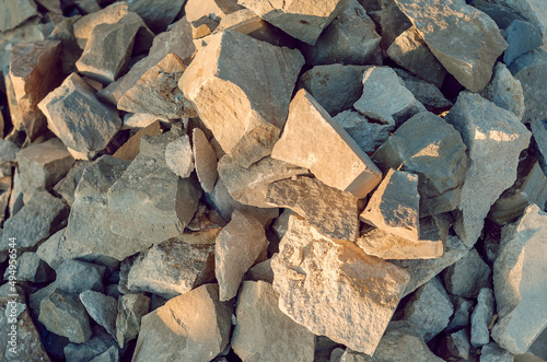 Stone, large chipped pieces of rubble. Construction background
