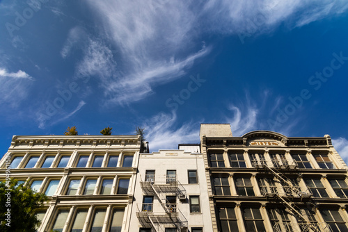 Rows of Loft buildings stand along the street in SOHO district on October 15, 2021 in New York City NY USA. 