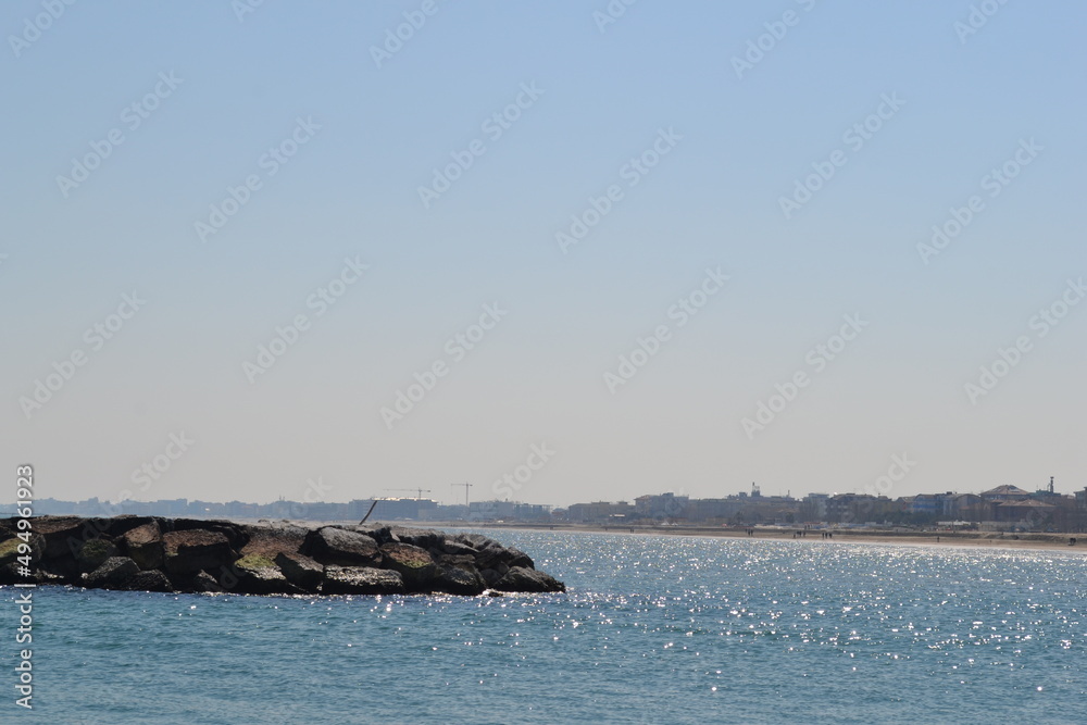We are located in Cesenatico, an Italian town in Romagna, on the coast of the Adriatic Sea. View of the port, beach, sea. We are located in Cesenatico, an Italian town in Romagna, on the coast of the Adriatic Sea. View of the port, beach, sea.