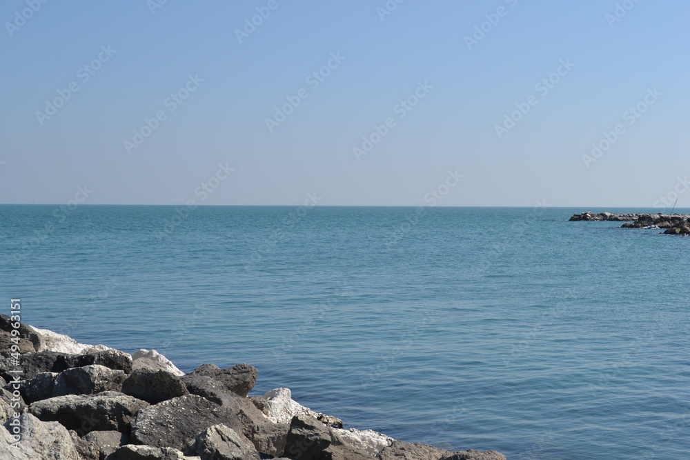 We are located in Cesenatico, an Italian town in Romagna, on the coast of the Adriatic Sea. View of the port, beach, sea.