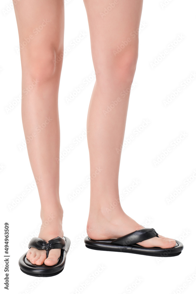 women shoes on legs on a white background women shoes on legs on a white background