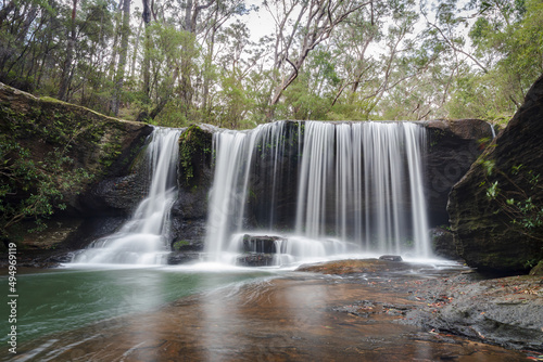 Beautiful streaming waterfall in the Morton National Park in Australia photo