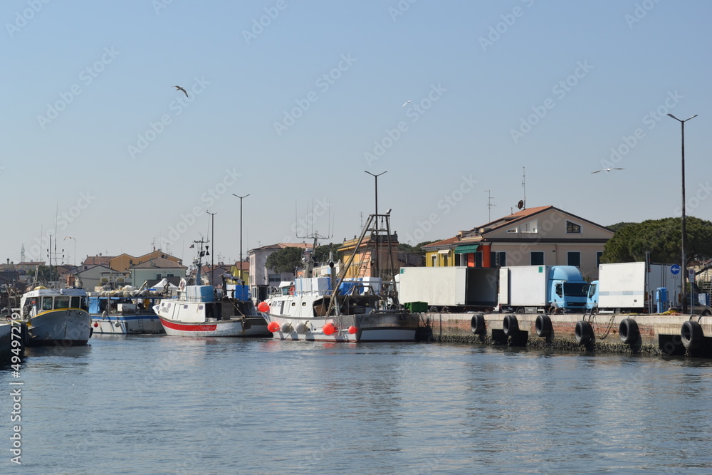 We are located in Cesenatico, an Italian town in Romagna, on the coast of the Adriatic Sea. Details of the quay of the canal port.
