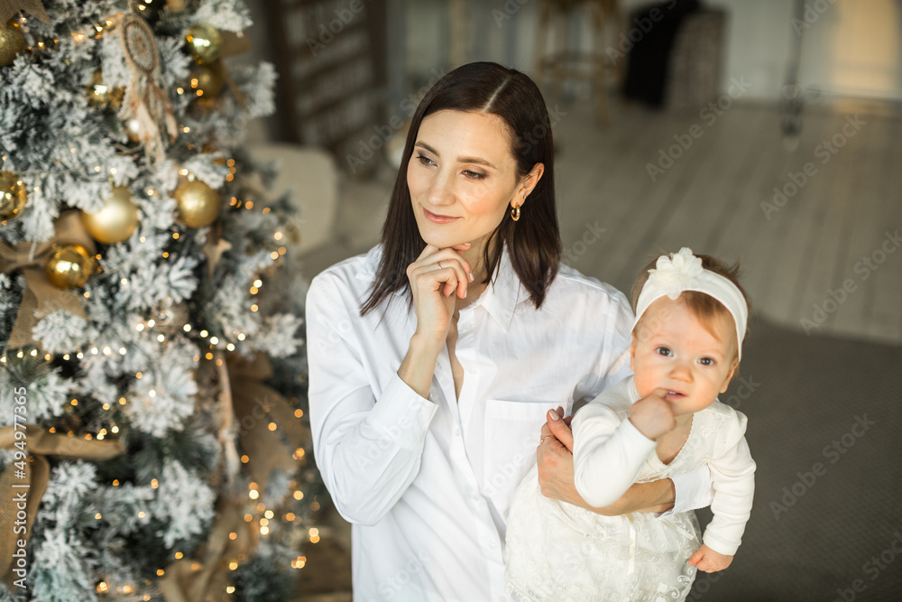 mother hugs little daughter, happy family relationship