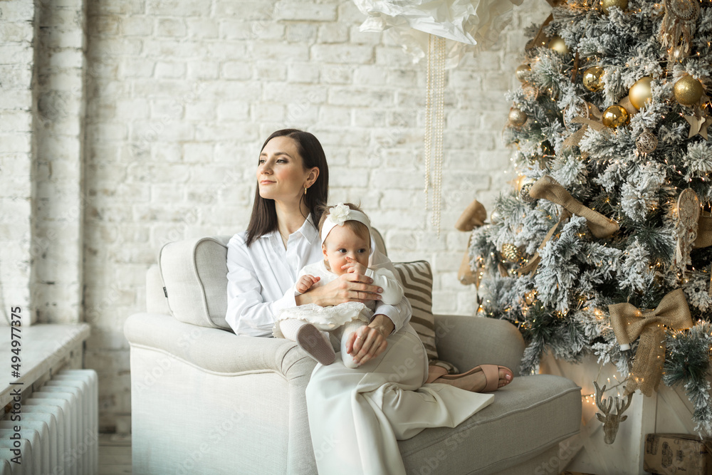 mother hugs little daughter, happy family relationship