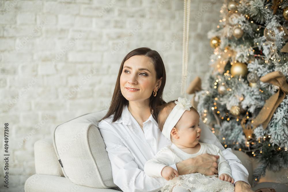 mother hugs little daughter, happy family relationship