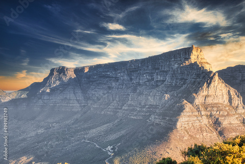 Closeup of the Table Mountain at Cape Town, South Africa against wispy clouds in the skiy in photo