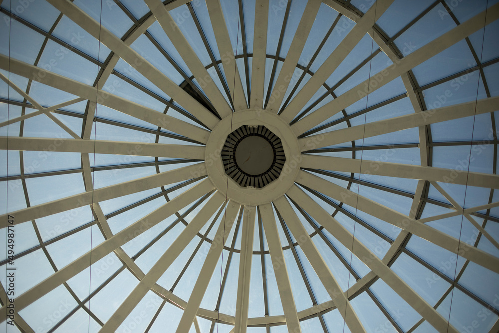 Dome of shopping center. Ceiling in building. Skylight.