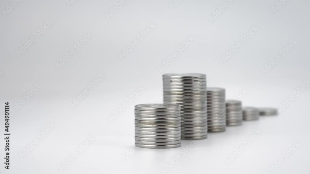 Stacks of Silver Coins Appear and Magnify on White Background. 4k Stop Motion, Financial Trading Concept Stacks of Silver Coins Appear and Magnify on White Background. 4k Stop Motion, Financial Trading Concept