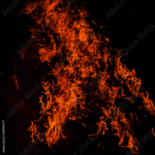 Fire flames on black background, Blaze fire flame texture background, Beautifully, the fire is burning, Fire flames with wood & cow dung