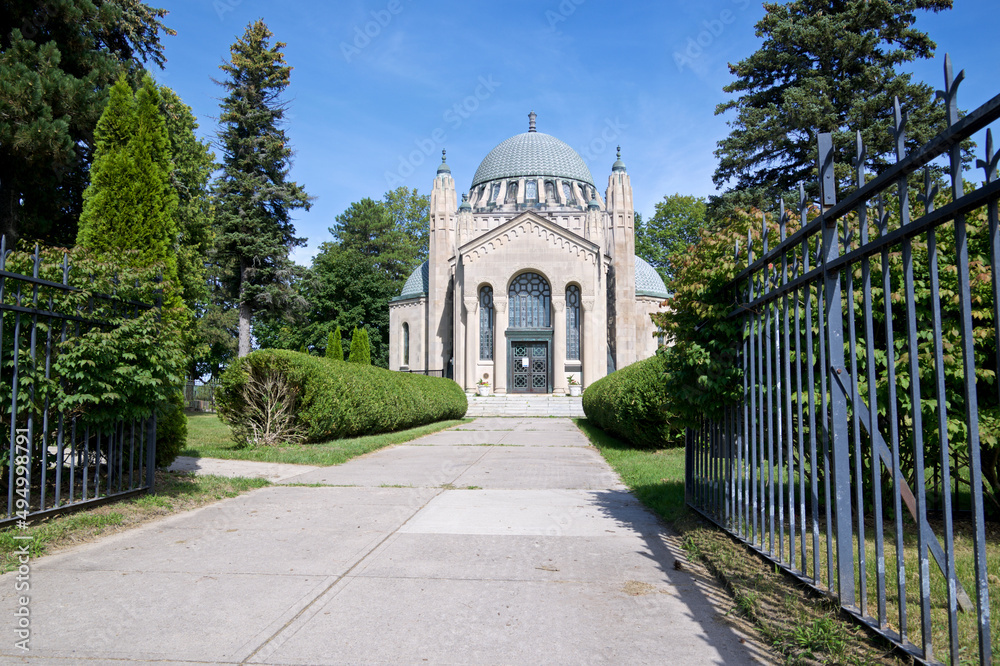 Thomas Foster Memorial in Uxbridge. It is a unique artistic treasure with solid bronze doors and stained glass windows.