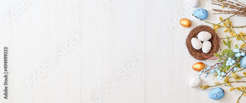 Canvas Print Willow branches and decorations, easter eggs on a light background