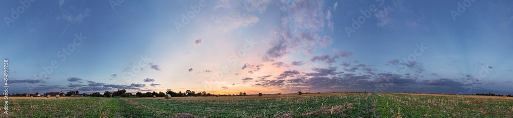 Panorama 360 degrees of countryside Olszanka at sunset after harvest.
