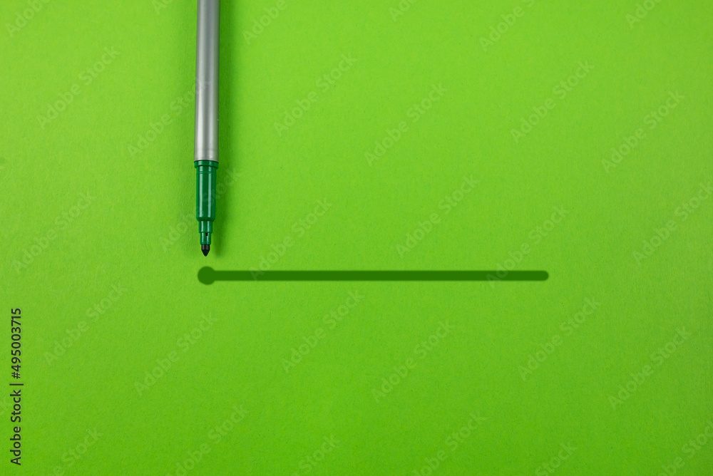 green marker with an outline to the end point on a green background. green marker with an outline to the end point on a green background.