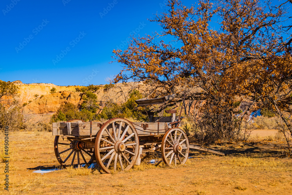 old wooden cart on the western landscape of New Mexico
