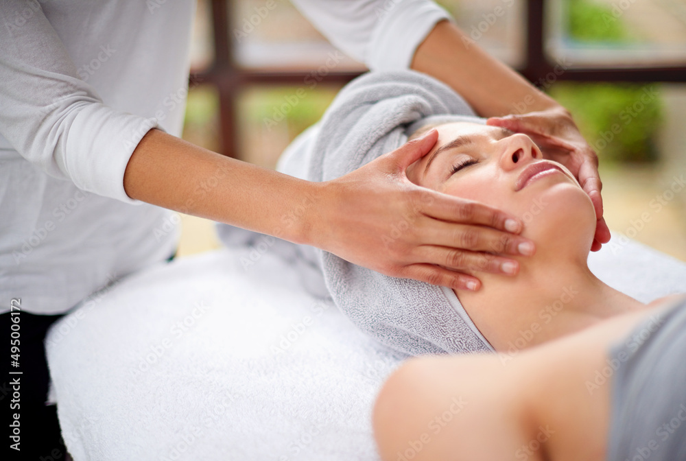 Getting rid of all the tension. Cropped shot of a young woman enjyoing a massage at the day spa. Getting rid of all the tension. Cropped shot of a young woman enjyoing a massage at the day spa.