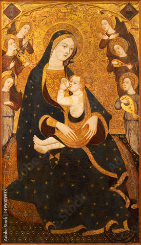 VALENCIA, SPAIN - FEBRUARY 14, 2022: The renaissance painting of Breast feeding Madonna - Virgen de la Humilidad by Llorens Saragossa (14. cent.) photo