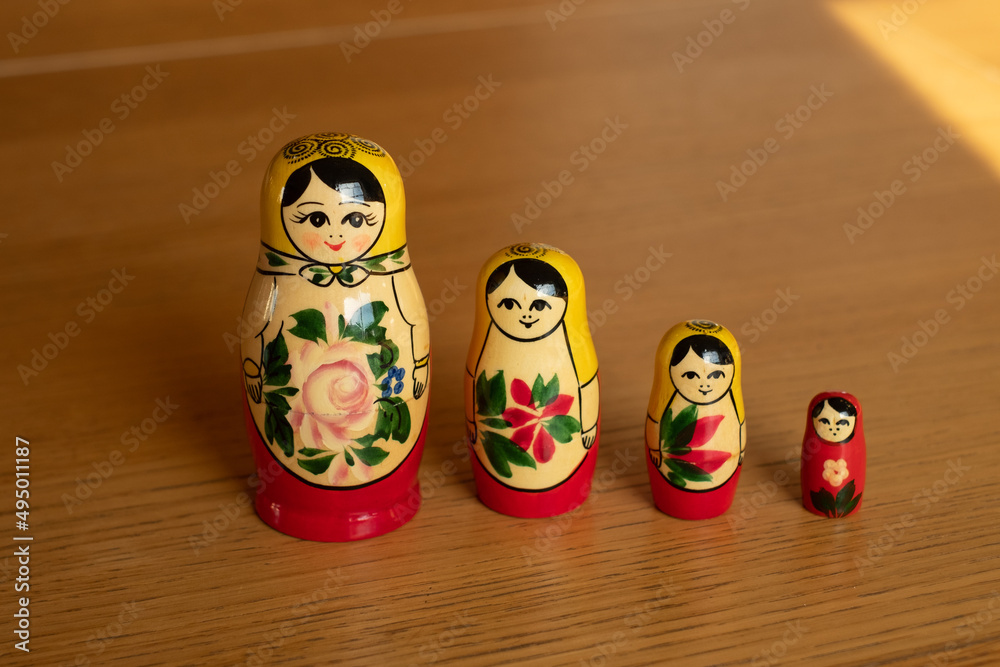 Set of traditional Russian wooden babushka dolls - matrioshka. Stacking or nested doll typical to Russia. Matrioshka brain concept.