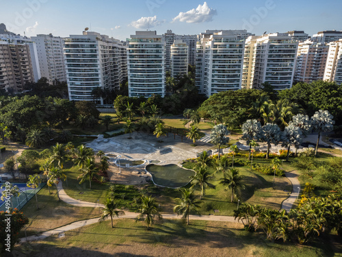 Aerial view of Rio 2 park in Rio de Janeiro, Brazil. Residential buildings and mountains around. Sunny day. Sunset. Drone photo photo