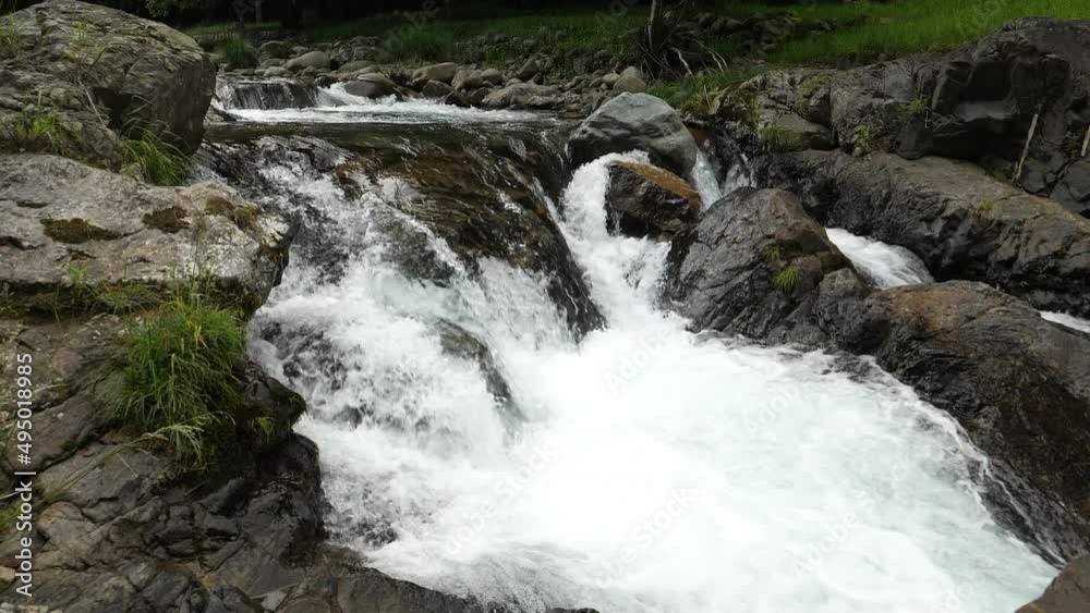 Stream of water in mountain streams. (Slow motion) Stream of water in mountain streams. (Slow motion)