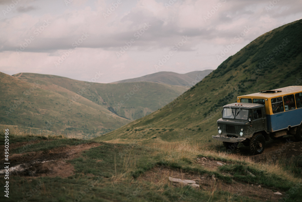 Fototapeta premium car in the beautiful mountains