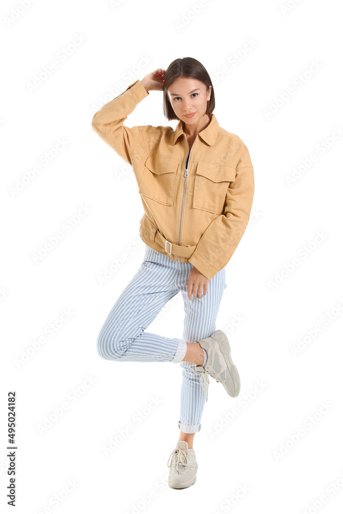 Pretty young woman in stylish clothes on white background Pretty young woman in stylish clothes on white background