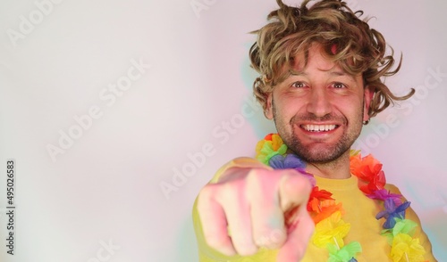 I Pick You. Portrait of excited young man pointing index fingers at camera, posing isolated over white studio background wall. Positive smiling adult male choosing and indicating