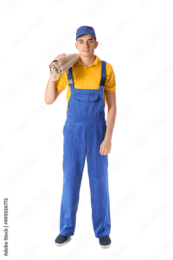 Male worker with rolled carpet on white background Male worker with rolled carpet on white background