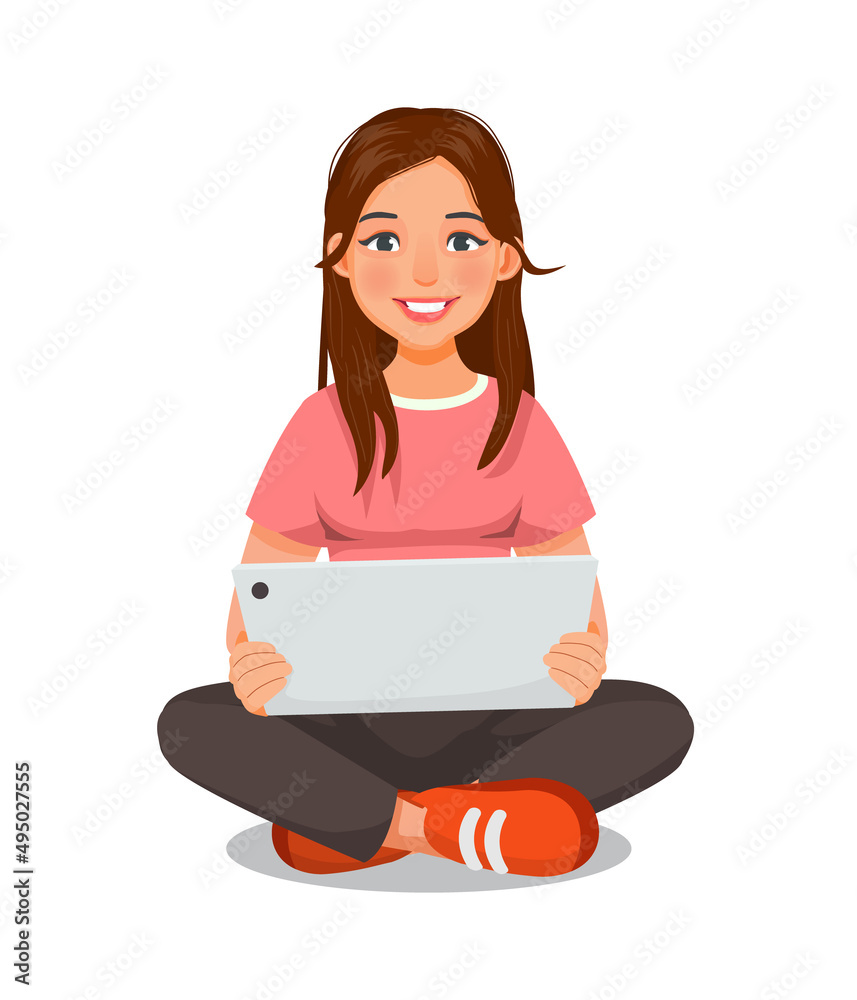 beautiful young woman sitting on the floor while using a digital smart tablet device for reading news, browsing Internet, watching videos and checking social networks beautiful young woman sitting on the floor while using a digital smart tablet device for reading news, browsing Internet, watching videos and checking social networks