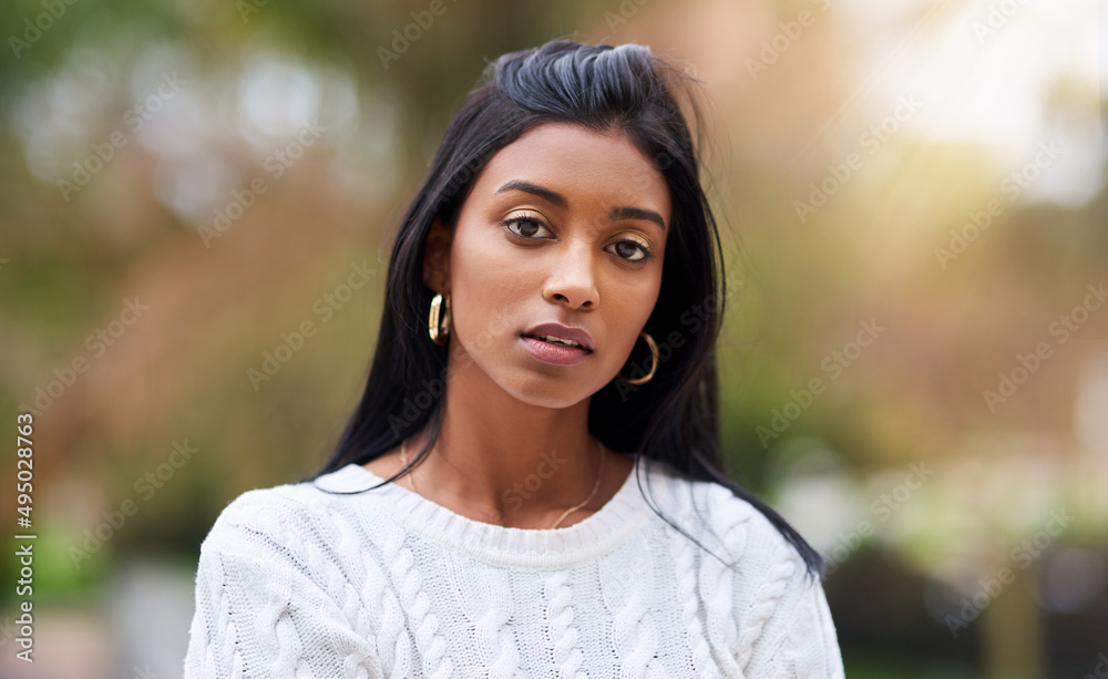 You deserve it all, beautiful. Cropped shot of a beautiful young woman standing outdoors. You deserve it all, beautiful. Cropped shot of a beautiful young woman standing outdoors.