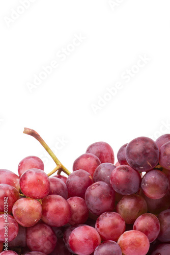 Red grapes photographed in a studio on a white background.