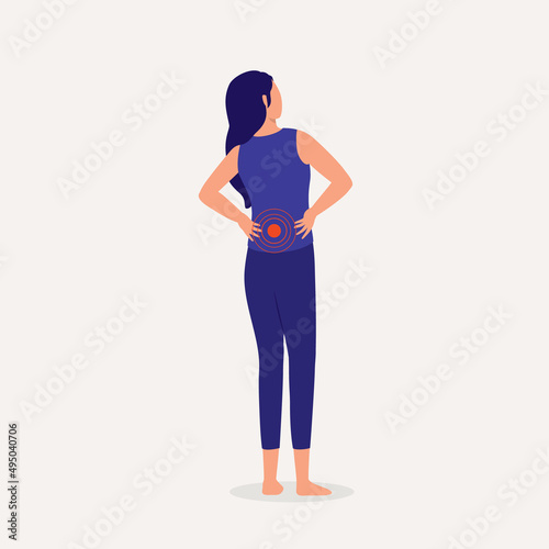 Young Woman Holding Her Back In Pain.