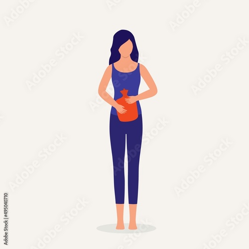 Young Woman Using Hot Water Bottle To Relieve Stomach Ache Or Cramp.