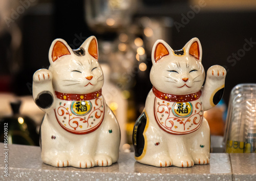 Cute cat decorations waving hand brings fortune