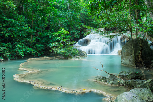 Beautiful Erawan tropical waterfall in Kanchanaburi province  Thailand. Travel in tropical forest concept.