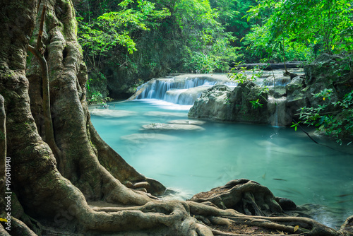 Beautiful Erawan tropical waterfall in Kanchanaburi province, Thailand. Travel green nature tropical holiday concept. photo