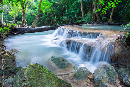 Beautiful Erawan tropical waterfall in Kanchanaburi province  Thailand. Travel tropical forest concept.
