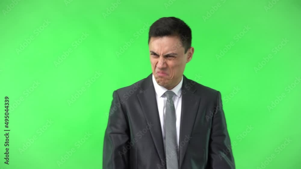 Elegant man with disgusted face in studio Elegant man with disgusted face in studio