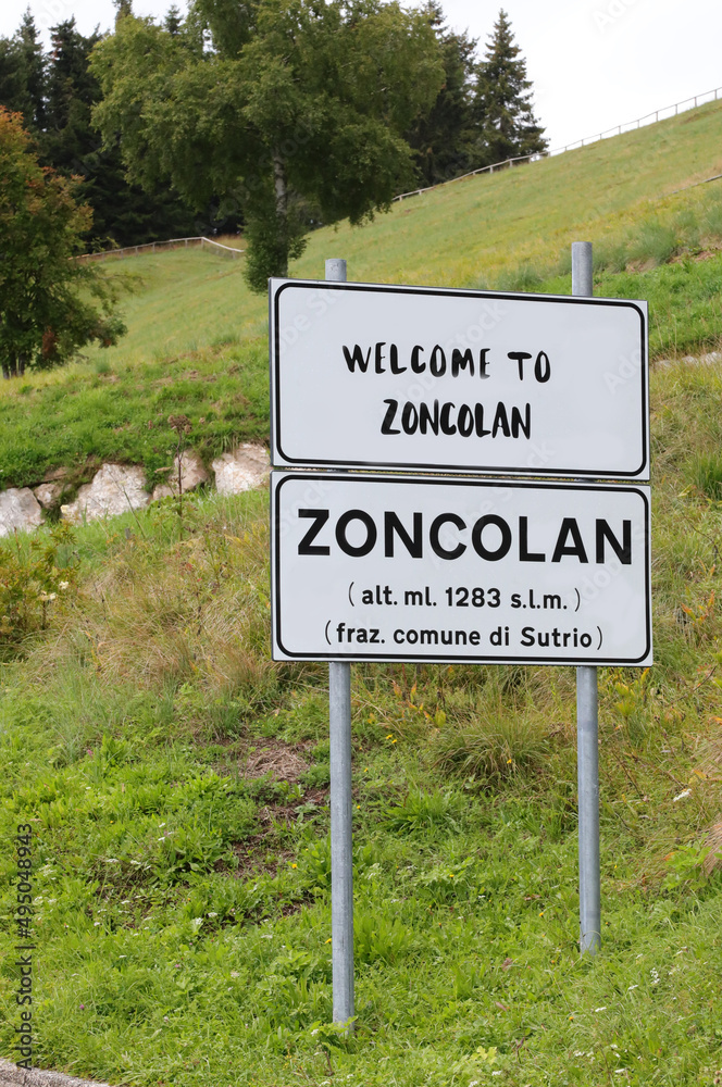 text Zoncolan on the road sign indicating the great mountain in Italy a favorite destination for many cyclists