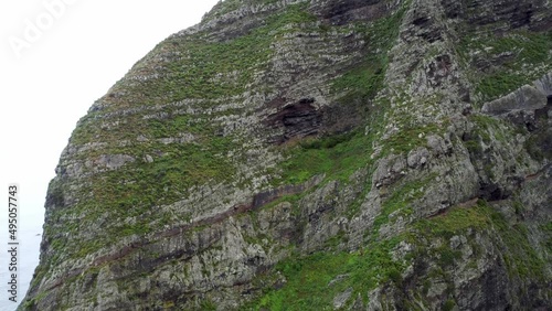 Beautifull mountain drone aerial view, close flying along the rock in Madeira