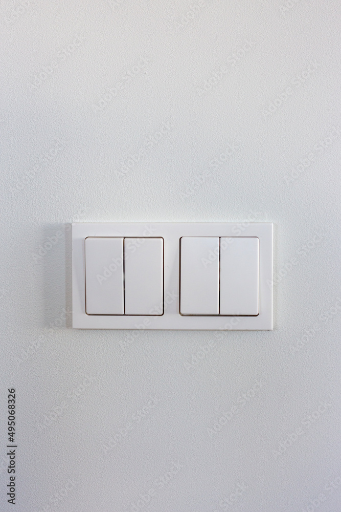 White light switches on a white wall White light switches on a white wall